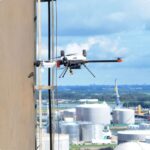 image of a drone by a wall